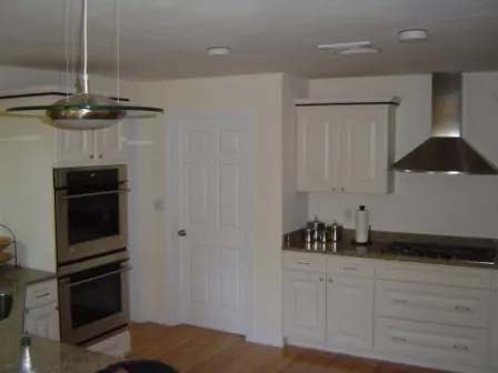Kitchen stove with hood